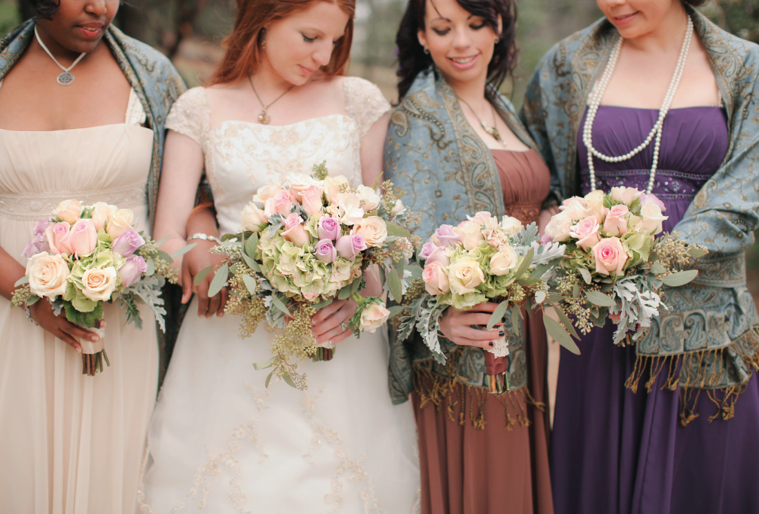 bride and bridesmaids portrait with bouquets